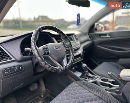 Белый Хендай Туксон, объемом двигателя 2 л и пробегом 131 тыс. км за 17600 $, фото 24 на Automoto.ua