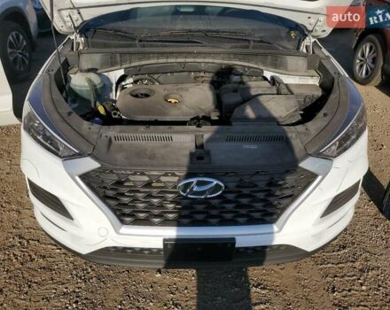 Белый Хендай Туксон, объемом двигателя 2 л и пробегом 105 тыс. км за 4900 $, фото 10 на Automoto.ua