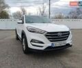 Белый Хендай Туксон, объемом двигателя 2 л и пробегом 42 тыс. км за 17200 $, фото 1 на Automoto.ua