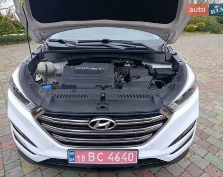 Білий Хендай Туксон, об'ємом двигуна 2 л та пробігом 169 тис. км за 19999 $, фото 56 на Automoto.ua