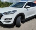 Белый Хендай Туксон, объемом двигателя 2 л и пробегом 161 тыс. км за 21700 $, фото 1 на Automoto.ua