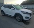 Белый Хендай Туксон, объемом двигателя 2 л и пробегом 129 тыс. км за 10800 $, фото 3 на Automoto.ua