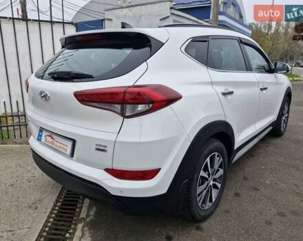Белый Хендай Туксон, объемом двигателя 2 л и пробегом 111 тыс. км за 19999 $, фото 4 на Automoto.ua