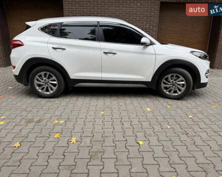 Білий Хендай Туксон, об'ємом двигуна 2 л та пробігом 77 тис. км за 21700 $, фото 11 на Automoto.ua