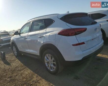 Белый Хендай Туксон, объемом двигателя 2 л и пробегом 105 тыс. км за 4900 $, фото 1 на Automoto.ua