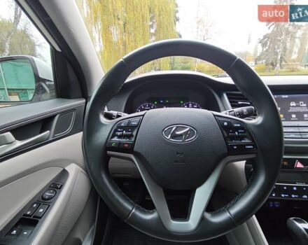 Белый Хендай Туксон, объемом двигателя 2.36 л и пробегом 75 тыс. км за 16700 $, фото 22 на Automoto.ua