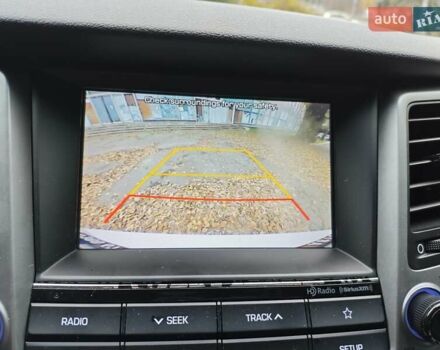 Белый Хендай Туксон, объемом двигателя 2.36 л и пробегом 75 тыс. км за 16700 $, фото 27 на Automoto.ua