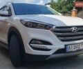 Белый Хендай Туксон, объемом двигателя 1.69 л и пробегом 227 тыс. км за 18600 $, фото 4 на Automoto.ua