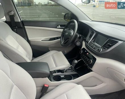 Белый Хендай Туксон, объемом двигателя 2 л и пробегом 91 тыс. км за 15900 $, фото 28 на Automoto.ua