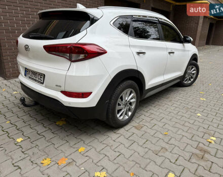 Білий Хендай Туксон, об'ємом двигуна 2 л та пробігом 77 тис. км за 21700 $, фото 9 на Automoto.ua