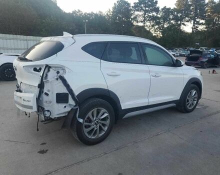 Белый Хендай Туксон, объемом двигателя 2 л и пробегом 129 тыс. км за 10800 $, фото 2 на Automoto.ua