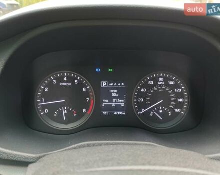 Белый Хендай Туксон, объемом двигателя 2.36 л и пробегом 75 тыс. км за 16700 $, фото 23 на Automoto.ua