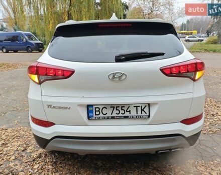 Белый Хендай Туксон, объемом двигателя 2.36 л и пробегом 75 тыс. км за 16700 $, фото 6 на Automoto.ua