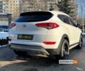 Білий Хендай Туксон, об'ємом двигуна 2.4 л та пробігом 67 тис. км за 19700 $, фото 6 на Automoto.ua