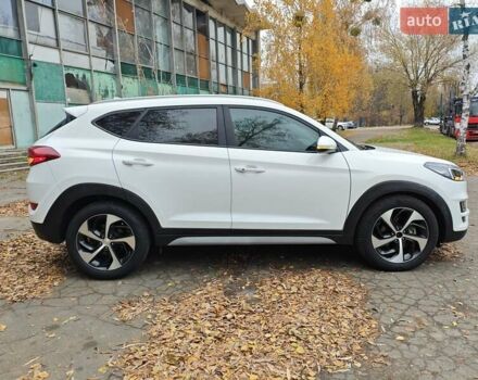 Белый Хендай Туксон, объемом двигателя 2.36 л и пробегом 75 тыс. км за 16700 $, фото 3 на Automoto.ua
