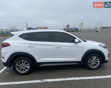 Белый Хендай Туксон, объемом двигателя 2 л и пробегом 91 тыс. км за 15900 $, фото 9 на Automoto.ua