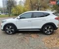 Белый Хендай Туксон, объемом двигателя 2.36 л и пробегом 75 тыс. км за 16700 $, фото 4 на Automoto.ua