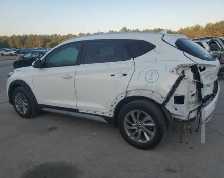 Белый Хендай Туксон, объемом двигателя 2 л и пробегом 129 тыс. км за 10800 $, фото 1 на Automoto.ua