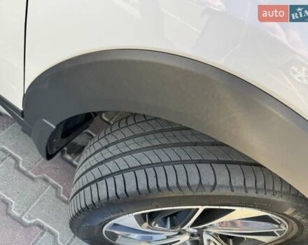 Белый Хендай Туксон, объемом двигателя 2 л и пробегом 97 тыс. км за 24800 $, фото 11 на Automoto.ua