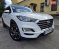 Белый Хендай Туксон, объемом двигателя 2 л и пробегом 71 тыс. км за 22800 $, фото 1 на Automoto.ua
