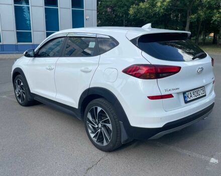 Білий Хендай Туксон, об'ємом двигуна 2 л та пробігом 74 тис. км за 25500 $, фото 2 на Automoto.ua
