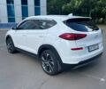 Білий Хендай Туксон, об'ємом двигуна 2 л та пробігом 74 тис. км за 25500 $, фото 2 на Automoto.ua