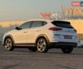 Белый Хендай Туксон, объемом двигателя 2 л и пробегом 119 тыс. км за 23500 $, фото 13 на Automoto.ua