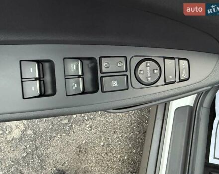 Белый Хендай Туксон, объемом двигателя 2 л и пробегом 114 тыс. км за 23900 $, фото 20 на Automoto.ua