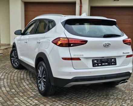 Білий Хендай Туксон, об'ємом двигуна 2 л та пробігом 79 тис. км за 12100 $, фото 2 на Automoto.ua