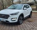 Белый Хендай Туксон, объемом двигателя 2 л и пробегом 133 тыс. км за 21000 $, фото 1 на Automoto.ua