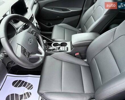 Белый Хендай Туксон, объемом двигателя 2 л и пробегом 114 тыс. км за 23900 $, фото 17 на Automoto.ua