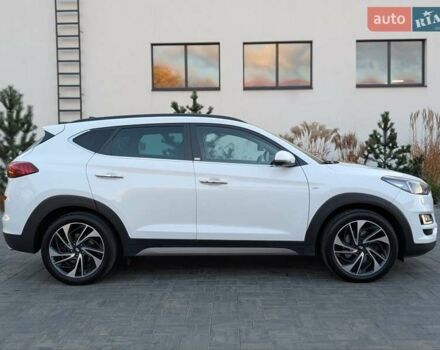 Білий Хендай Туксон, об'ємом двигуна 1.6 л та пробігом 152 тис. км за 21950 $, фото 4 на Automoto.ua