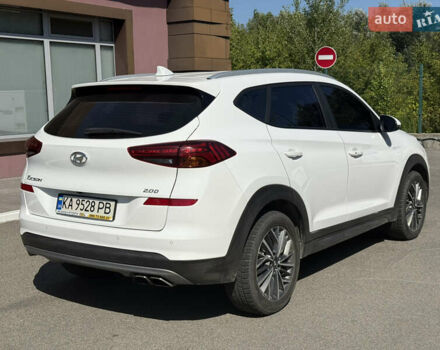 Белый Хендай Туксон, объемом двигателя 2 л и пробегом 167 тыс. км за 22499 $, фото 6 на Automoto.ua