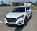 Белый Хендай Туксон, объемом двигателя 2.4 л и пробегом 150 тыс. км за 18900 $, фото 2 на Automoto.ua