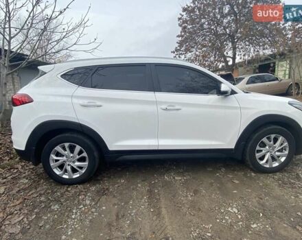 Білий Хендай Туксон, об'ємом двигуна 2 л та пробігом 40 тис. км за 20700 $, фото 8 на Automoto.ua