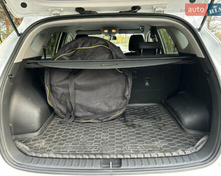 Білий Хендай Туксон, об'ємом двигуна 2 л та пробігом 101 тис. км за 17800 $, фото 16 на Automoto.ua