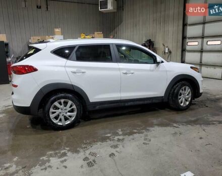 Белый Хендай Туксон, объемом двигателя 2 л и пробегом 97 тыс. км за 4400 $, фото 2 на Automoto.ua