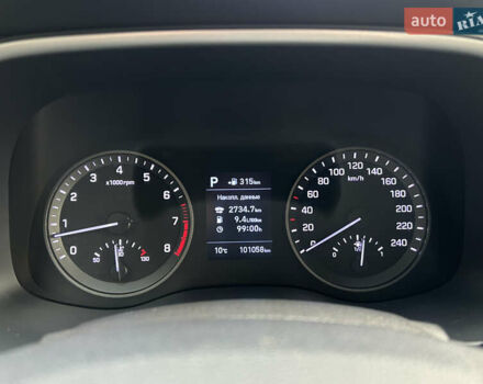 Білий Хендай Туксон, об'ємом двигуна 2 л та пробігом 101 тис. км за 17800 $, фото 15 на Automoto.ua