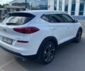 Білий Хендай Туксон, об'ємом двигуна 2 л та пробігом 74 тис. км за 25500 $, фото 4 на Automoto.ua