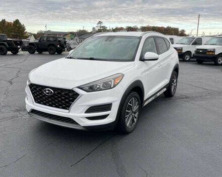 Белый Хендай Туксон, объемом двигателя 2.4 л и пробегом 34 тыс. км за 9100 $, фото 2 на Automoto.ua