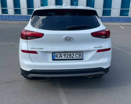 Білий Хендай Туксон, об'ємом двигуна 2 л та пробігом 74 тис. км за 25500 $, фото 3 на Automoto.ua