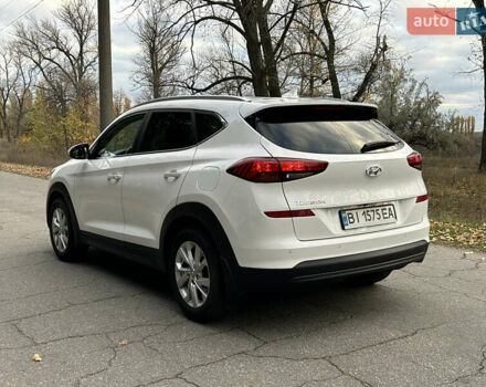 Білий Хендай Туксон, об'ємом двигуна 2 л та пробігом 101 тис. км за 17800 $, фото 3 на Automoto.ua