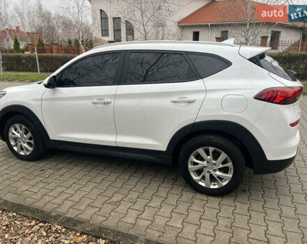 Білий Хендай Туксон, об'ємом двигуна 2 л та пробігом 136 тис. км за 22900 $, фото 5 на Automoto.ua
