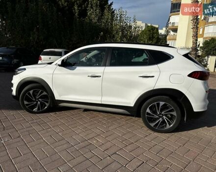 Белый Хендай Туксон, объемом двигателя 2 л и пробегом 50 тыс. км за 22500 $, фото 8 на Automoto.ua