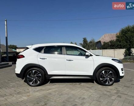 Білий Хендай Туксон, об'ємом двигуна 2 л та пробігом 109 тис. км за 23500 $, фото 4 на Automoto.ua
