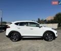 Білий Хендай Туксон, об'ємом двигуна 2 л та пробігом 109 тис. км за 23500 $, фото 4 на Automoto.ua