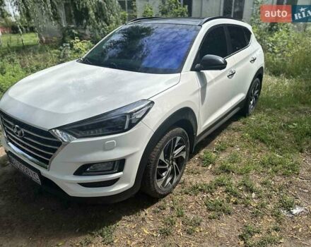 Белый Хендай Туксон, объемом двигателя 2 л и пробегом 99 тыс. км за 23450 $, фото 1 на Automoto.ua