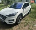 Белый Хендай Туксон, объемом двигателя 2 л и пробегом 99 тыс. км за 23450 $, фото 1 на Automoto.ua