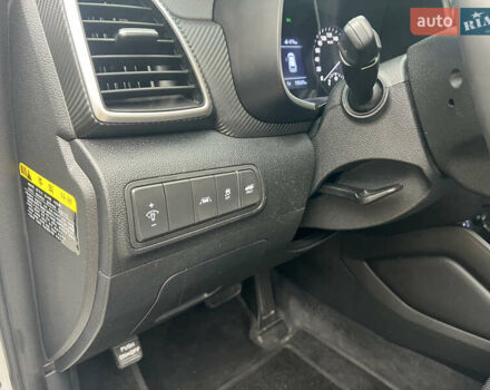 Білий Хендай Туксон, об'ємом двигуна 2 л та пробігом 136 тис. км за 22900 $, фото 13 на Automoto.ua