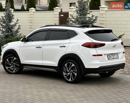 Белый Хендай Туксон, объемом двигателя 2 л и пробегом 50 тыс. км за 23800 $, фото 21 на Automoto.ua